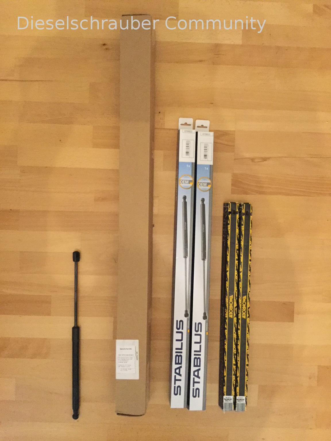 Links neue STABILUS Gasdruckfeder 016823, rechts daneben ihre Umverpackung! (zum Vergleich ganz rechts MONROE ML5831) STABILUS 016823 LIFT-O-MAT (zu gross verpackt...).JPG